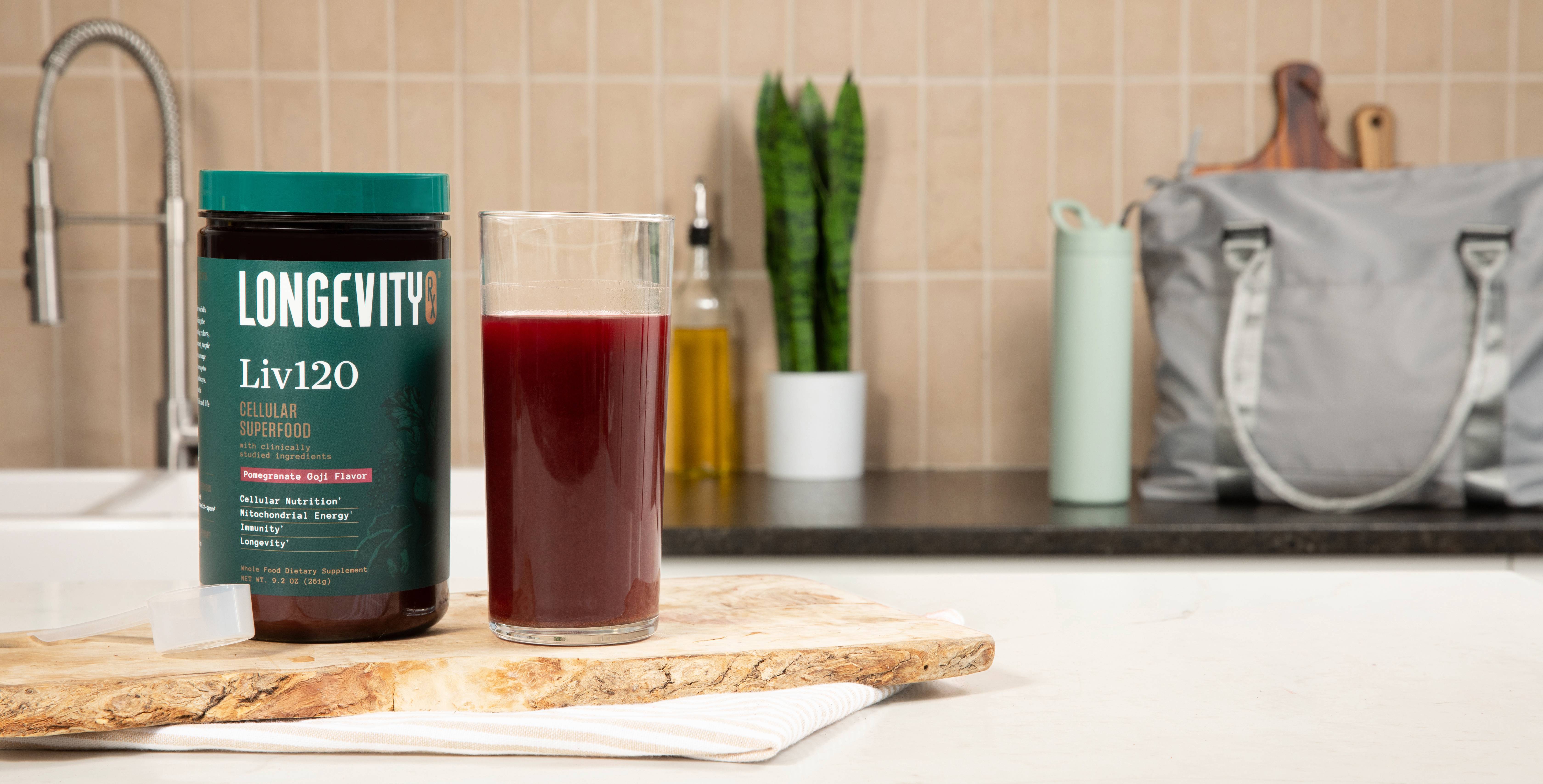 Liv120 Cellular Superfood mixed in a glass on a kitchen counter