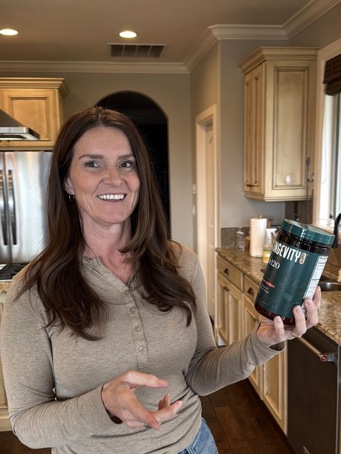 Liv120 member in her kitchen with her jar