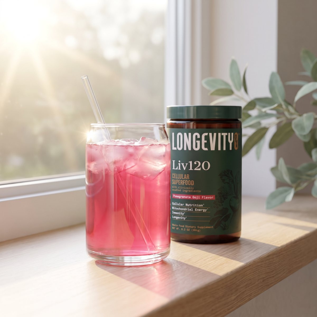 A glass of pink Liv120 in soft morning window light